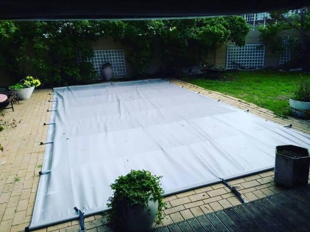 Pool covers, solid safety covers and safety nets